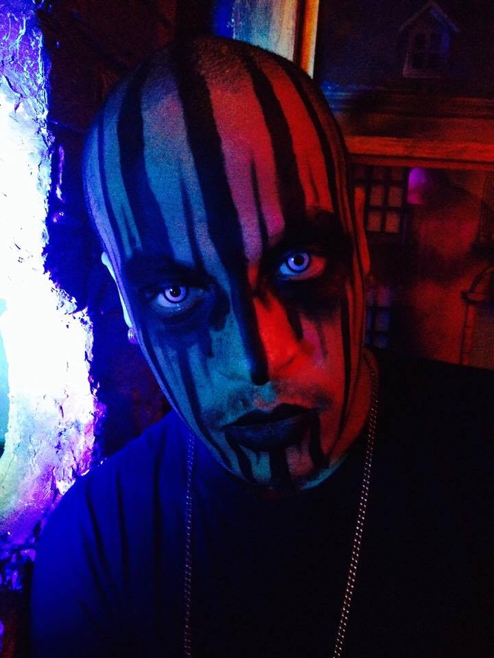 Male performer with Voodoo makeup for Halloween
