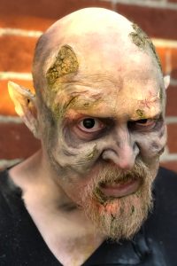 Prosthetics & makeup to create a behemoth demon