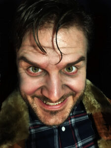 Man with Johnny makeup from The Shining.