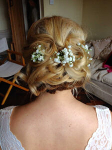 Bridal hair updo with accessories.