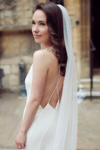 A bride with a long veil.