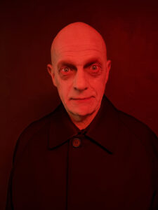 Uncle Fester character makeup for Halloween.