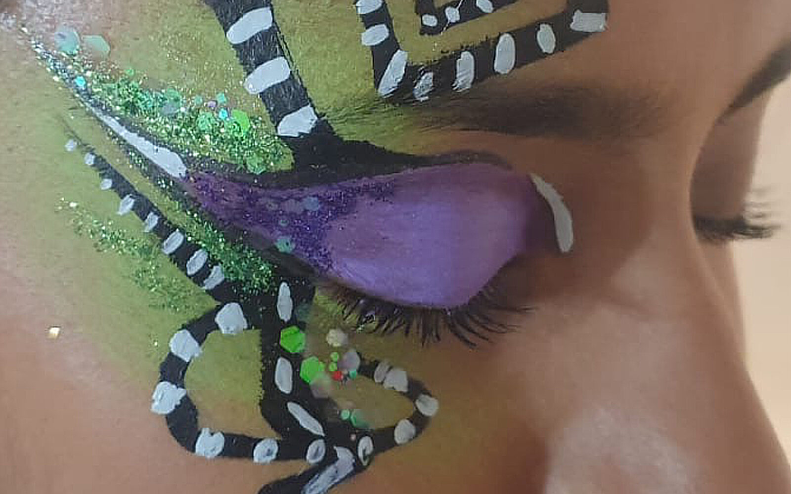 Tim Burton-style makeup on the eye of a dancer for a London event launch.