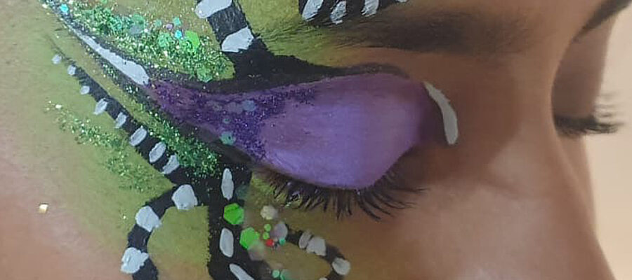 Tim Burton-style makeup on the eye of a dancer for a London event launch.