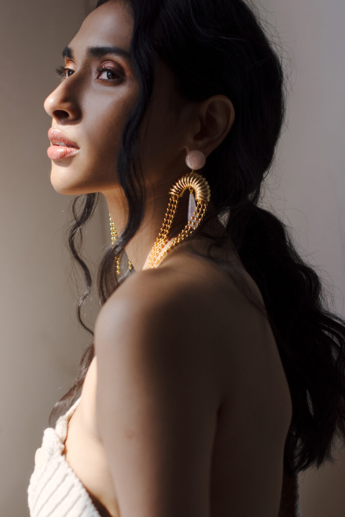 indian-bride-2 Indian bride with gold jewellery and long dark hair.